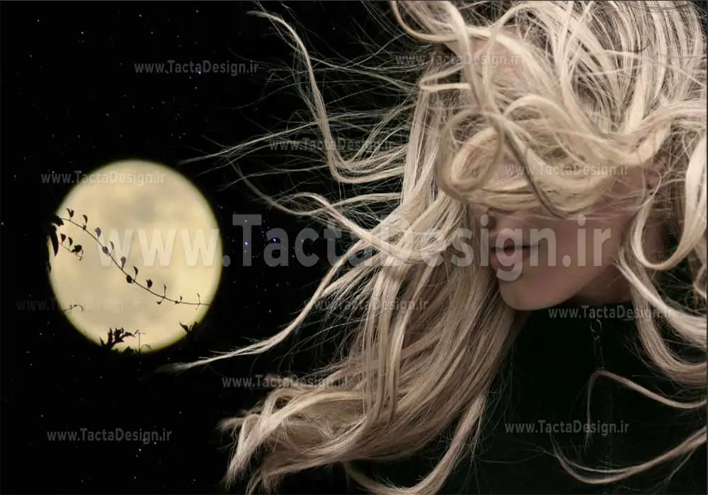 یک زن با مو های بلند در کنار ماه