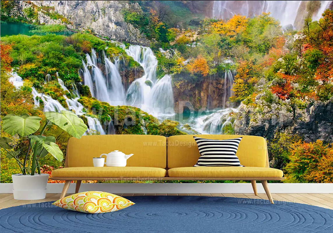 آبشار های در کنار هم در کنار رختان سبز و زرد در کنار دریاچه